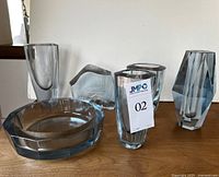 Group shot: four vases, bowl, figurine