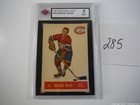 Front image of the 1957-58 Parkhurst Marcel Bonin hockey card graded 5 EX in protective case.