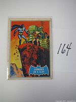 Front of 1966 Batman Blue Bat comic card titled 'Cornered on a Cliff'
