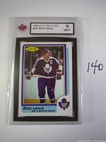 Close-up front view of the 1986-87 O-Pee-Chee Rick Vaive hockey card in protective slab with Mint 9 grading label.