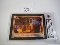 Front view of 1980 OPC Star Wars trading card #94 titled "End of the Star Warriors?" graded 8.5 by KSA showing characters and glowing staircase scene.
