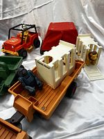 Photo showing the animal cages, gorilla and bear figures, and part of a trailer surface