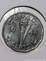 Victory reverse of 1945 Canadian nickel in holder