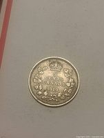 Reverse showing 5 CENTS CANADA 1919 within crowned maple wreath