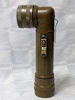 Full view of olive drab right-angle flashlight