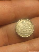 Reverse showing 5 CENTS CANADA 1919 with crown and wreath