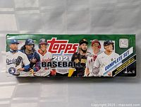 Front view of sealed Topps 2021 Baseball complete set box showing branding and player images