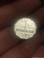 Reverse side showing CANADA NICKEL 1751-1951 5 CENTS Sudbury mine design