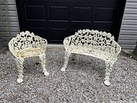 Overview of cast iron garden bench and chair side by side