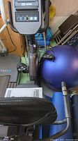 Overall view of recumbent bike with console, seat and purple yoga ball