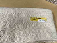 Close-up showing the knit pattern and the size label 40x60