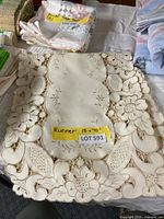 Table runner laid flat showing full design and size label 15x70 inches