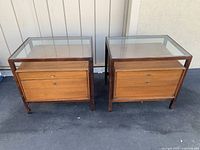Both nightstands side by side on pavement showing full lot