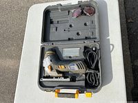 Opened case showing the Mastercraft Maximum barrel-grip jigsaw with attached power cord inside, along with a translucent protective cover slot.