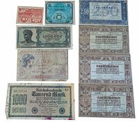 Photo displaying various vintage banknotes including Germany, Netherlands, France, and Greece notes laid out for clear view.