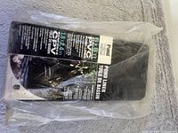 Front view of sealed new black PVC pond liner in original packaging with label showing size 6x8 feet and brand