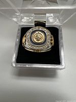 Front view of Winnipeg Jets ring showing circular face with logo and blue enamel accents surrounded by clear rhinestones.