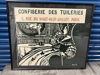 Framed French cafe poster with text and detailed graphic of woman and cafe scene