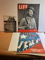 Photo of three items: Life Magazine August 1941, Star Dance Portfolio No. 28 music book, and Parker House book
