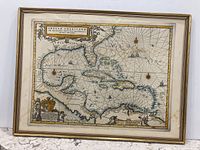 Front view of framed antique map showing Caribbean and parts of North America, in good condition without glass.