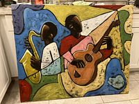 Full view of unframed oil painting illustrating two abstract musicians, one with saxophone and one with guitar, in vibrant colors.