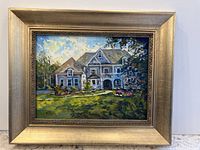 Framed oil painting of a large stately house in a garden setting.