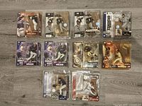 Top view showing 10 McFarlane MLB baseball figures in original blister card packaging, arranged for identification.