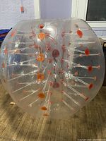Clear bumper ball with orange interior nodes