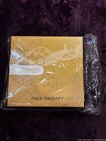 sealed gold box with brand and product name