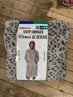 Front of packaged grey leopard print 32° Heat sleep lounger