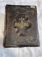 Front cover showing embossed leather and gold title