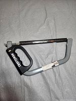 Gray frame Craftsman hack saw with black handle and adjustable blade tension