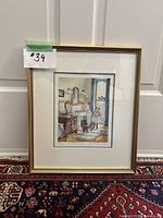 Framed and matted print of 'Taking Turns' showing the artwork clearly, with visible signature and number.