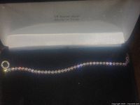 Bracelet in a box with '14 Karat Gold Made in Italy' marking on inner box lid.