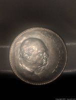 Obverse side showing Winston Churchill profile with name inscription.