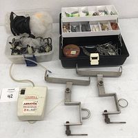 Overall lot showing fishing nets, rod holders, aerator, and tackle box with lures