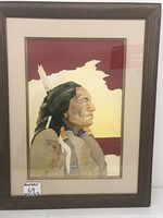 Framed watercolor painting depicting Native American man in profile with layered background and traditional attire.
