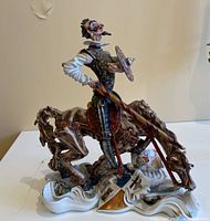 Full view of the Don Quixote glazed terracotta figurine on horseback showing the full figure with lance, shield, and detailed horse.