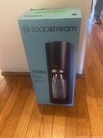Full front view of SodaStream Terra sparkling water maker box showing the product image and brand.