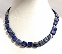 Close-up show of necklace on display bust