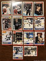 Lot of 14 assorted Wayne Gretzky hockey cards from various sets and years.