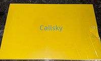Yellow rectangular box with CALLSKY logo on top, showing front face of the package.
