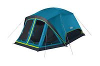 Full assembled outdoors blue tent with dark room and screened room, lime green trim ground cover and red clips on poles.