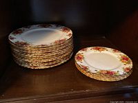Two stacks of Old Country Roses plates, larger and smaller sets
