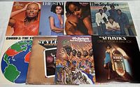 Eight vintage vinyl albums by The Stylistics arranged for photo showing album covers in good condition, colorful and varied artwork including portraits and group photos.