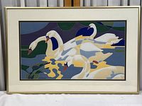 Full view of framed serigraph print showing the artwork with stylized ducks in quilted patchwork style with a gold frame.