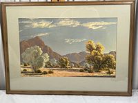Frontal image of the framed Midwestern landscape art print with visible wooden frame and beige mat