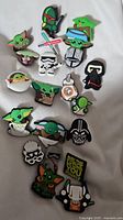 Crocs shoe charms featuring various Star Wars characters and icons, laying flat for clear view