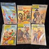 Photo of first six vintage Classics Illustrated comics with illustrated covers of Ivanhoe, Rumpelstiltskin, Waterloo, Julius Caesar, Buffalo Bill, and David Copperfield.
