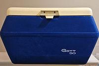Front view of blue and white Mid Century Gott 50 cooler with logo.